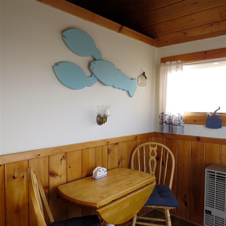 168 Shore Road, Unit 10 Truro, MA 02666 - Photo 9 of 9 a balcony with table and chairs