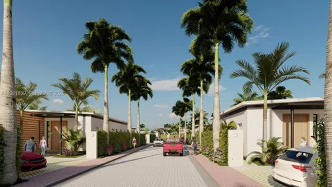 a view of multiple houses with palm trees