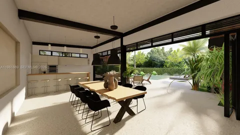 a dining room with furniture and a large window