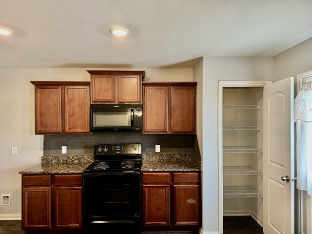 8018 Distant Harbor Road Cove, TX 77523 - Photo 6 of 14 Pantry, stove and microwave. Refrigerator will be added for tenant use