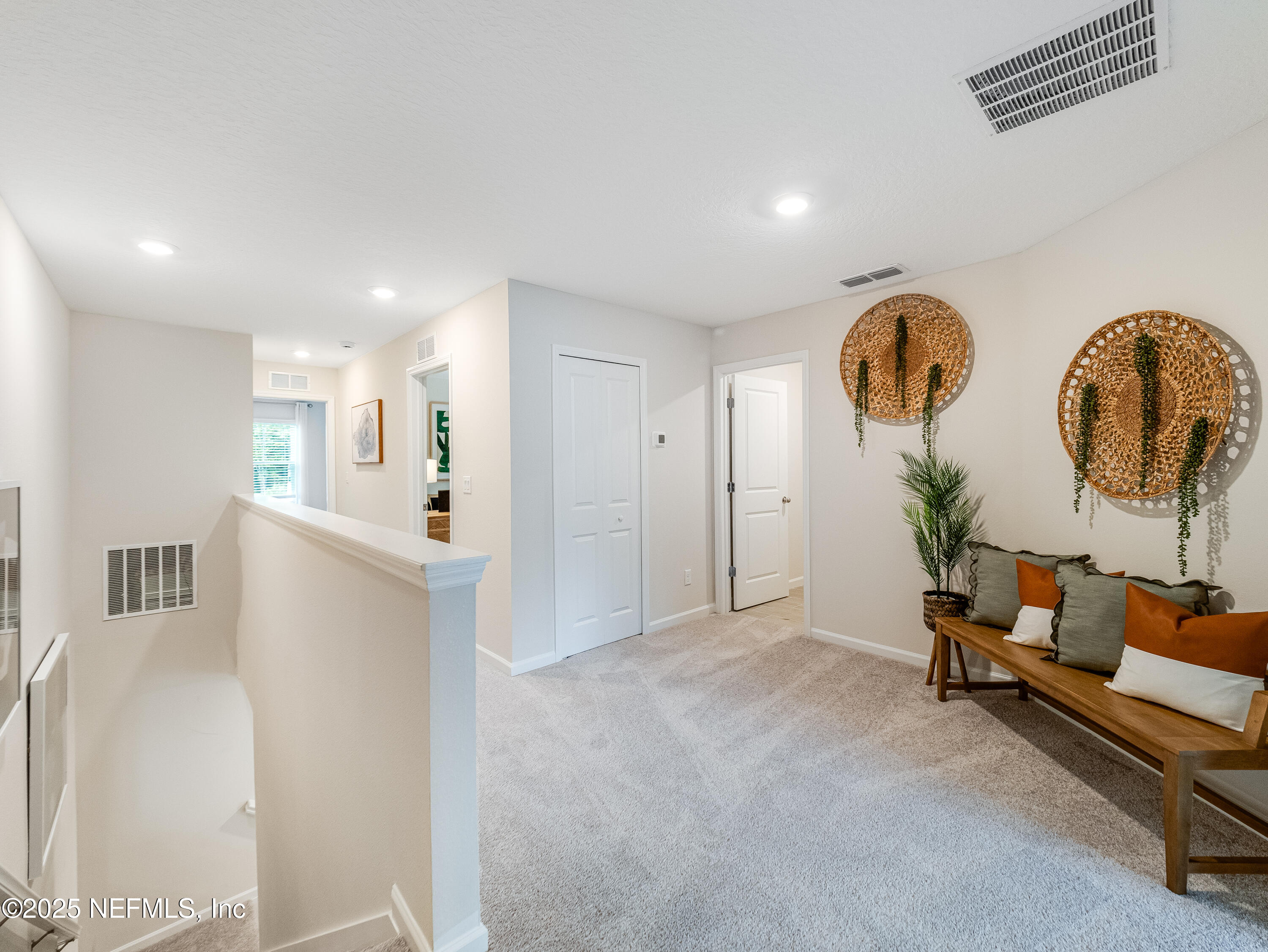 131 Hubbard Bend St. Augustine, FL 32092 - Photo 24 of 42 a view of room with furniture and wooden floor