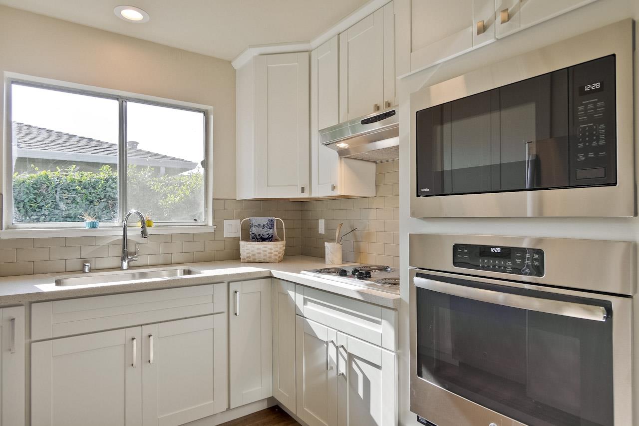 805 Devoto Street Mountain View, CA 94041 - Photo 13 of 26 a kitchen with a sink stove and microwave