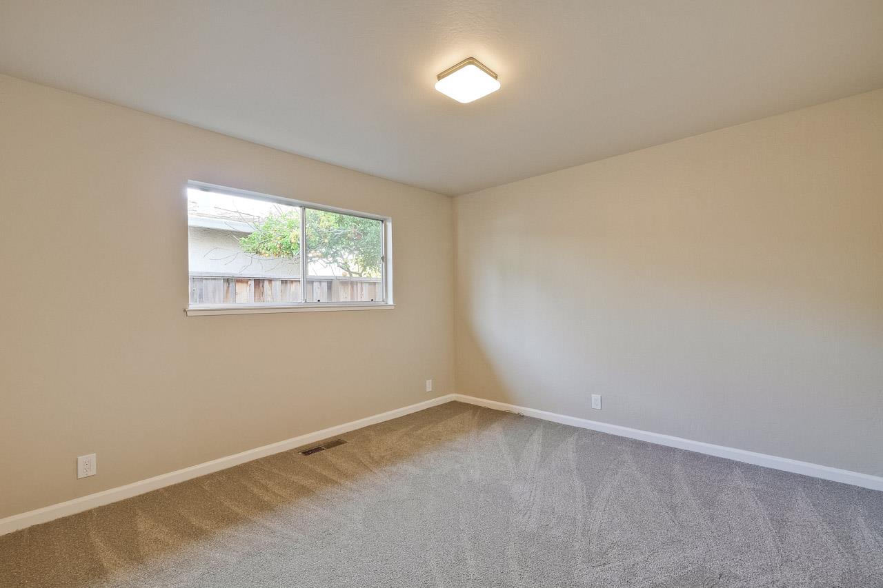 805 Devoto Street Mountain View, CA 94041 - Photo 16 of 26 an empty room with windows