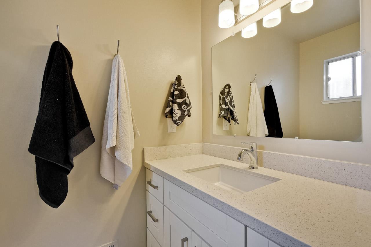 805 Devoto Street Mountain View, CA 94041 - Photo 20 of 26 a bathroom with a sink vanity and a mirror