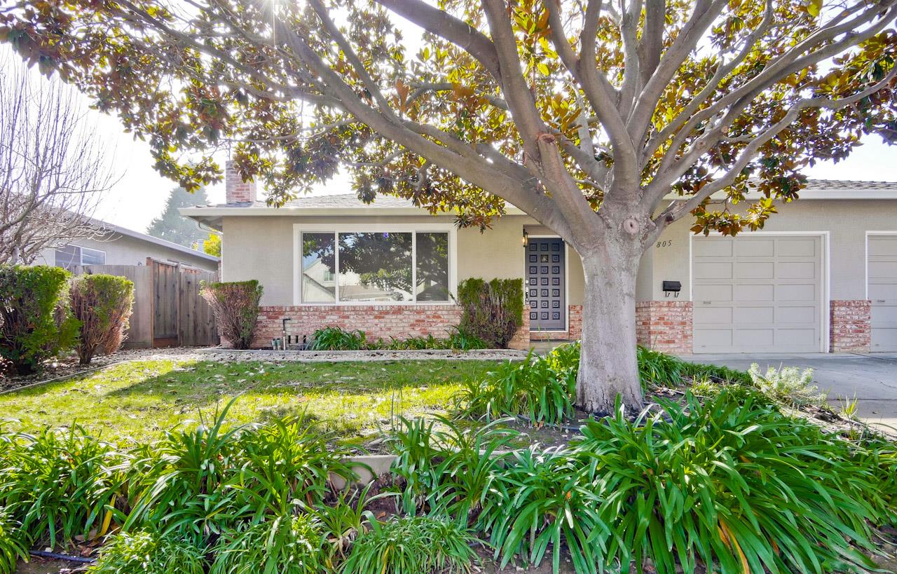 805 Devoto Street Mountain View, CA 94041 - Photo 2 of 26 a front view of a house with garden