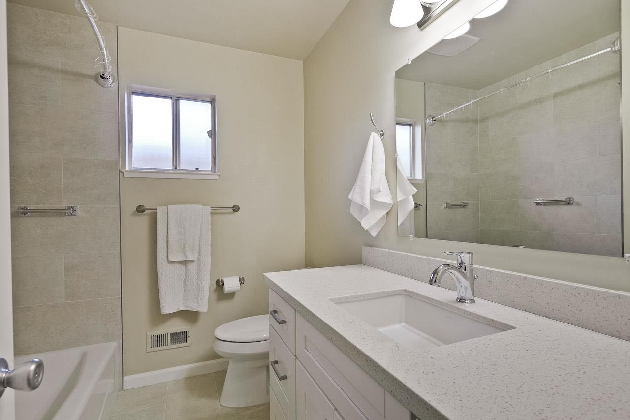 805 Devoto Street Mountain View, CA 94041 - Photo 23 of 26 a bathroom with a sink a toilet and shower