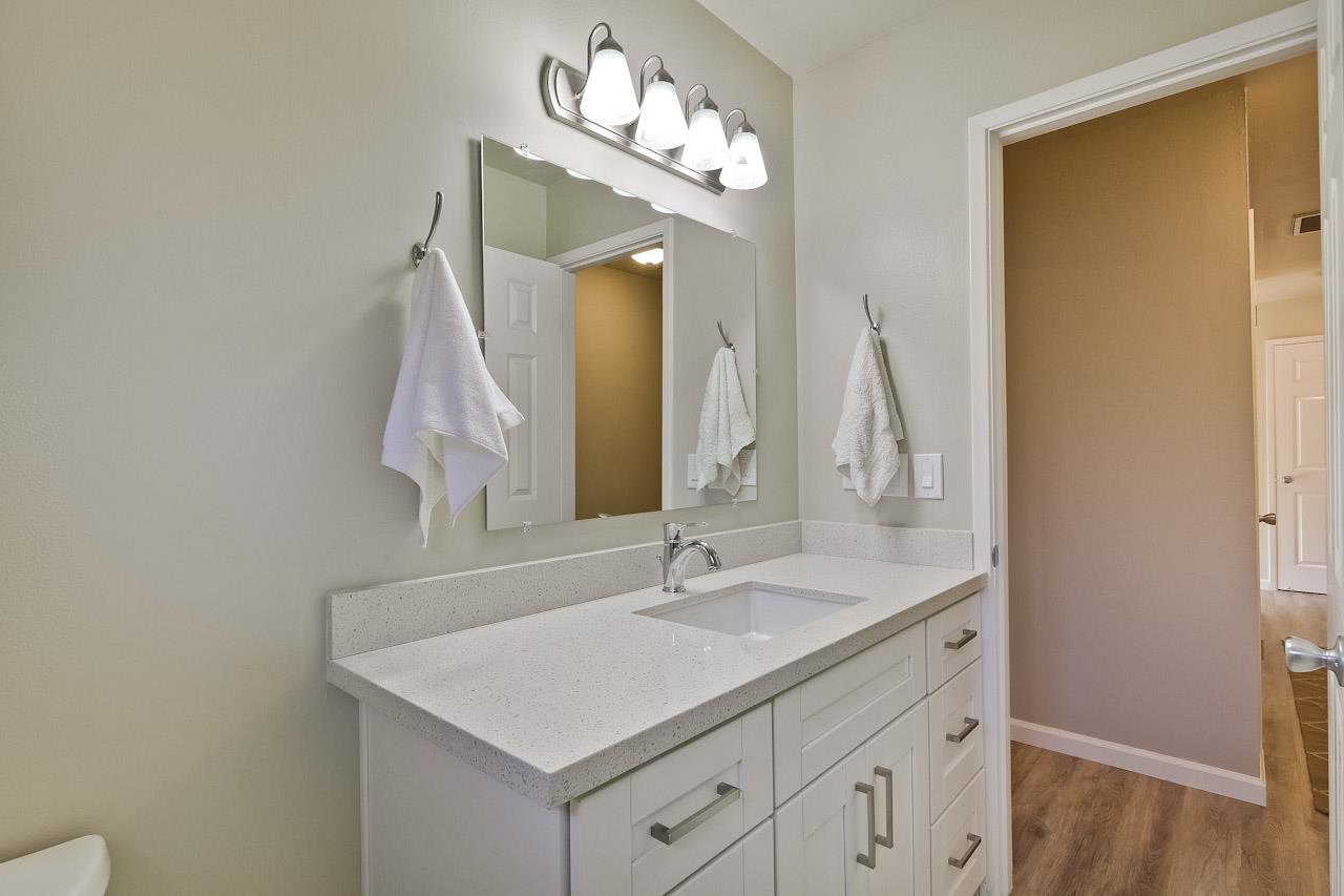 805 Devoto Street Mountain View, CA 94041 - Photo 24 of 26 a bathroom with a sink vanity and a mirror