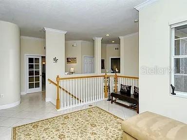 8263 Miramar Way Lakewood Ranch, FL 34202 - Photo 16 of 54 a view of a hallway with workspace and a window