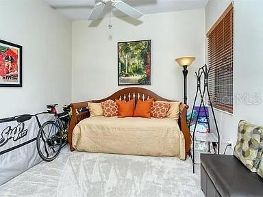 8263 Miramar Way Lakewood Ranch, FL 34202 - Photo 25 of 54 a bedroom with a bed and a window