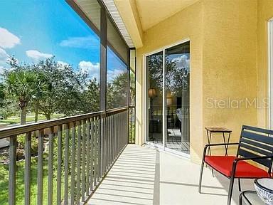 8263 Miramar Way Lakewood Ranch, FL 34202 - Photo 31 of 54 a balcony view with a large window