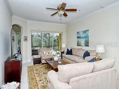 8263 Miramar Way Lakewood Ranch, FL 34202 - Photo 4 of 54 a living room with furniture and a large window
