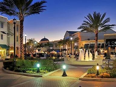 8263 Miramar Way Lakewood Ranch, FL 34202 - Photo 50 of 54 a view of swimming pool with a table and chairs