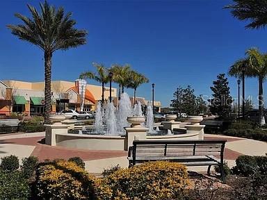 8263 Miramar Way Lakewood Ranch, FL 34202 - Photo 51 of 54 a view of a patio with swimming pool table and chairs