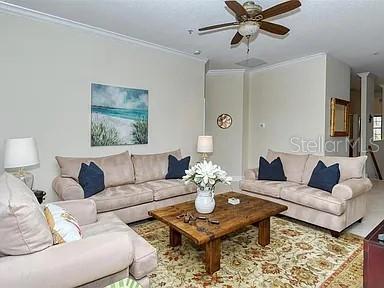 8263 Miramar Way Lakewood Ranch, FL 34202 - Photo 6 of 54 a living room with furniture and a rug