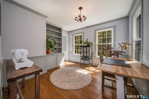 a living room with furniture and window