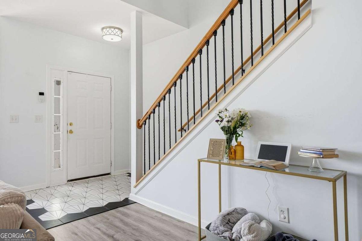 166 Odyssey Conyers, GA 30012 - Photo 9 of 42 a view of entryway and workspace