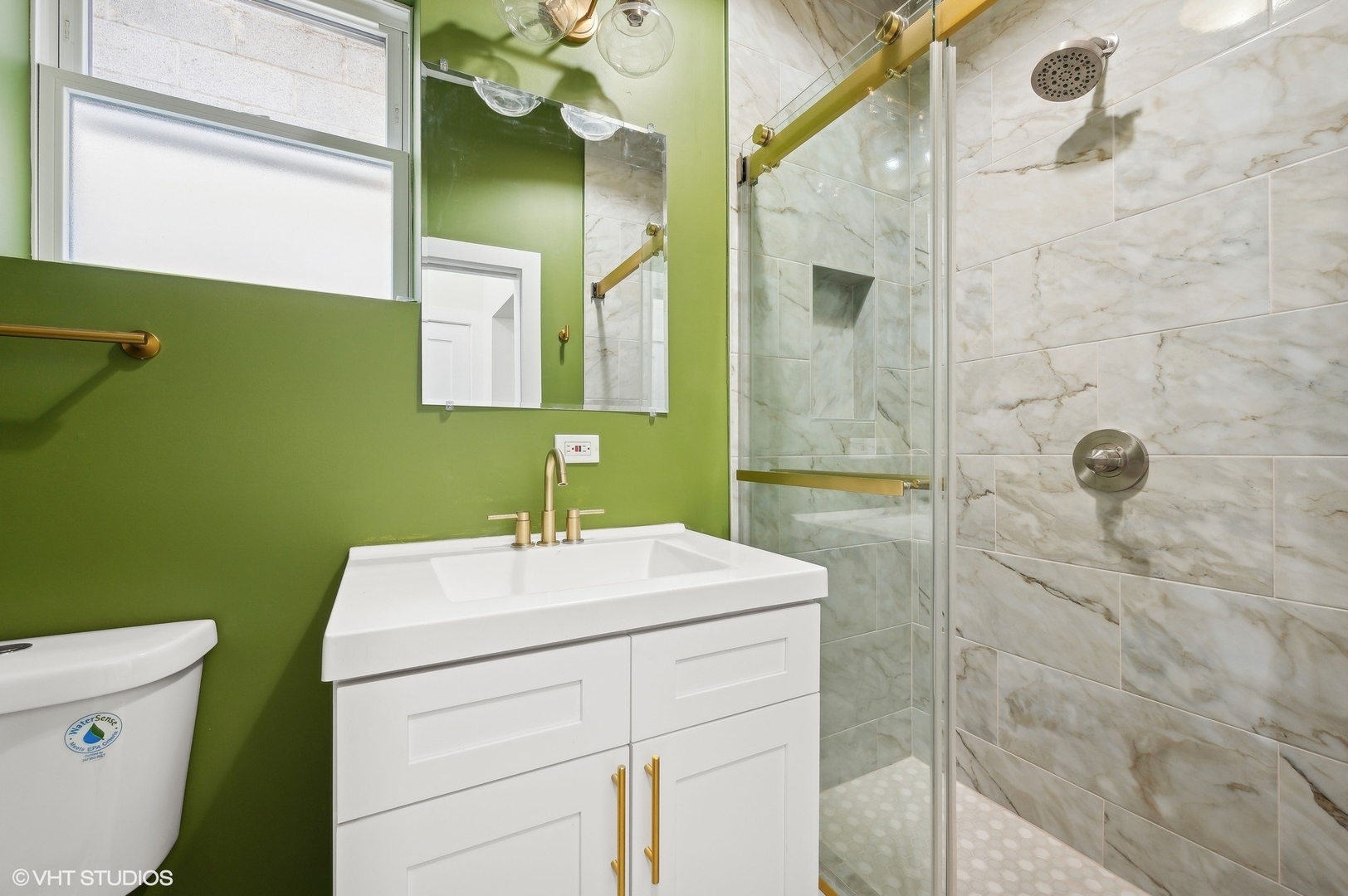 2313 West Fullerton Avenue Chicago, IL 60647 - Photo 12 of 25 a bathroom with a sink a toilet and shower