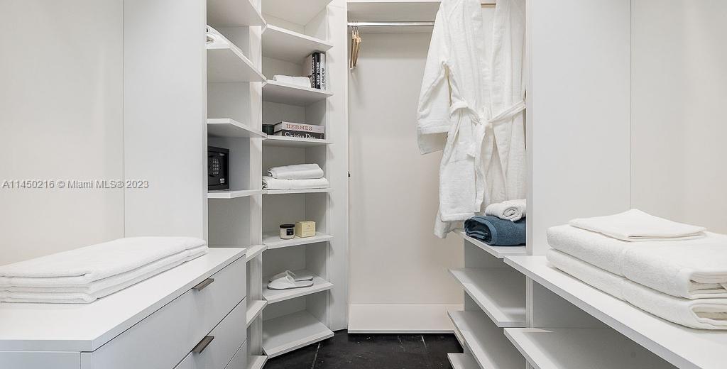2001 Biscayne Boulevard, Unit 2104 Miami, FL 33137 - Photo 12 of 17 a bathroom with a sink and a mirror