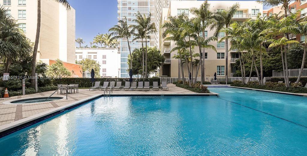 2001 Biscayne Boulevard, Unit 2104 Miami, FL 33137 - Photo 17 of 17 a view of swimming pool with outdoor seating and lake view