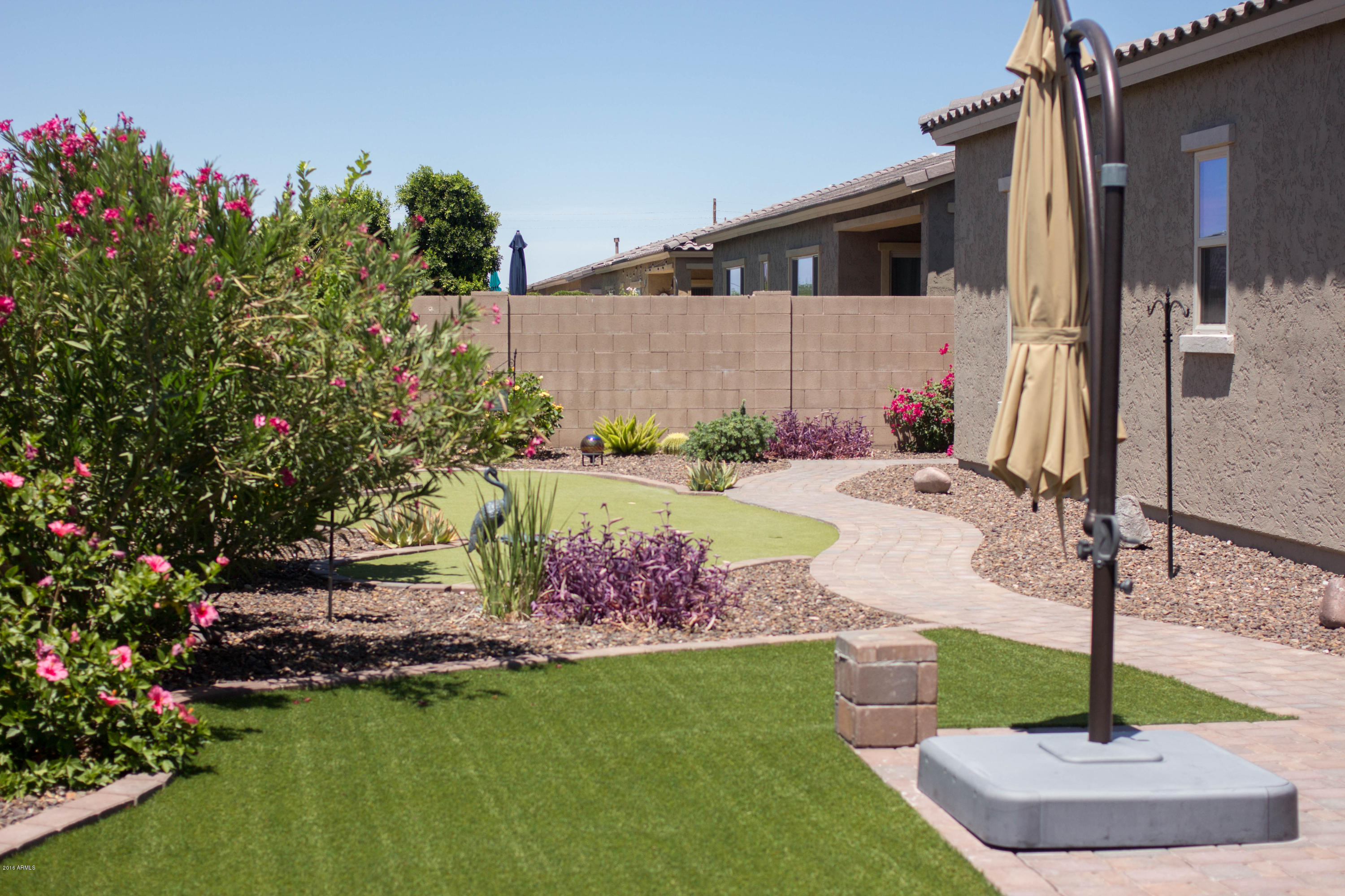 20117 East Quintero Road Queen Creek, AZ 85142 - Photo 70 of 82 Synthetic lawn is green year round!
