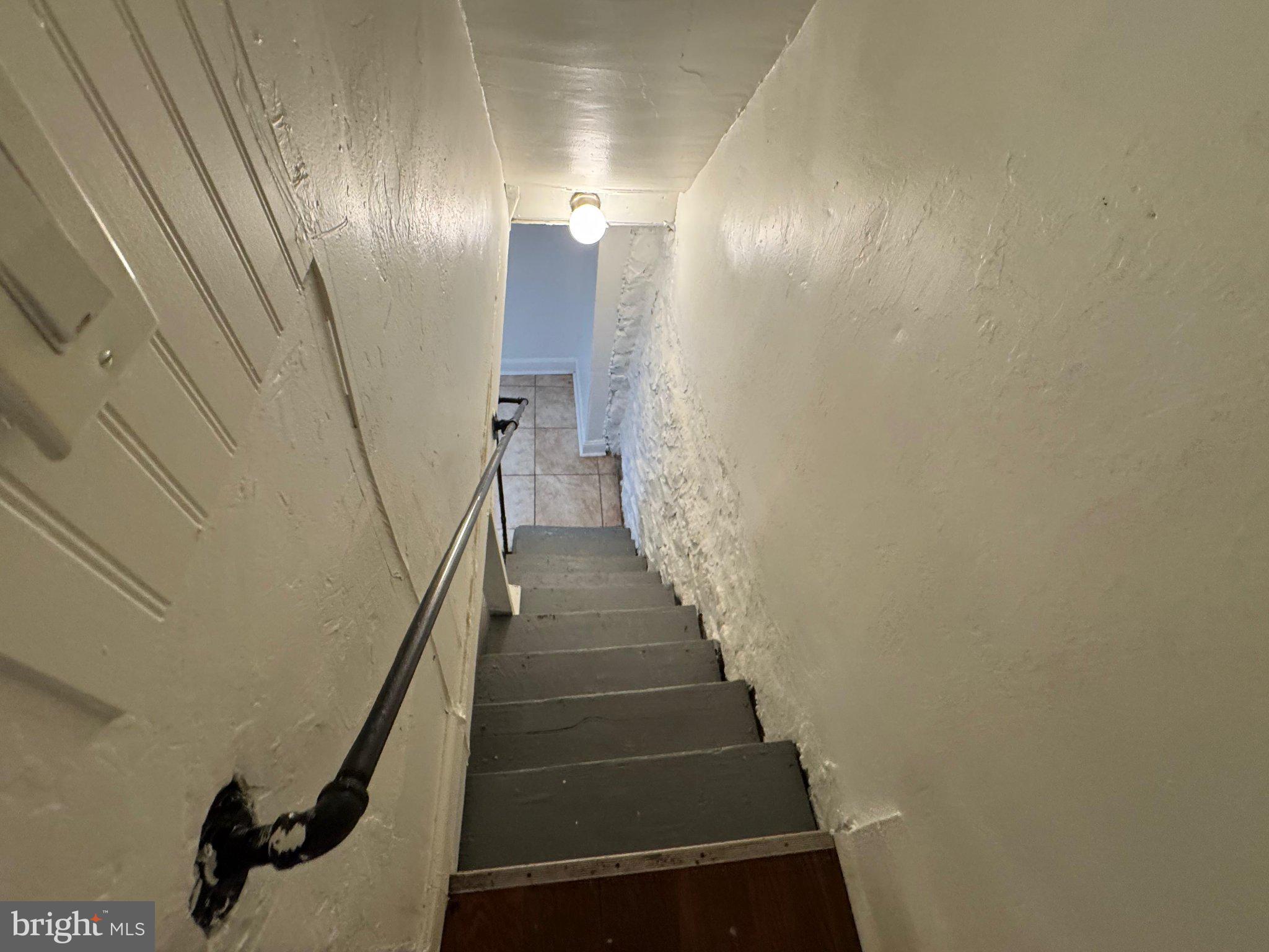 707 Denison Street Baltimore, MD 21229 - Photo 10 of 18 Inviting descent into cozy charm.