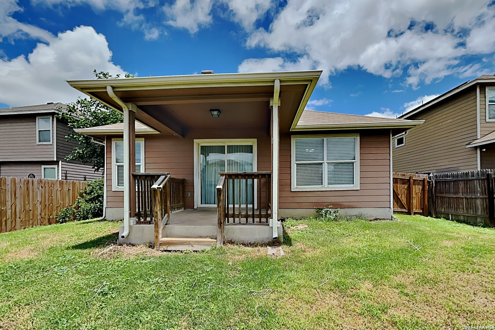 6510 Poseidon Way Converse, TX 78109 - Photo 15 of 16 a front view of a house with a yard
