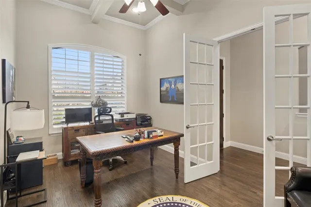 a workspace with furniture and window