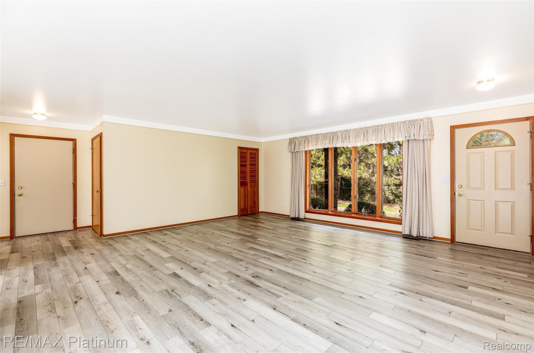909 Chase Lake Road Howell, MI 48855 - Photo 16 of 37 Check out the amazingly bright area!