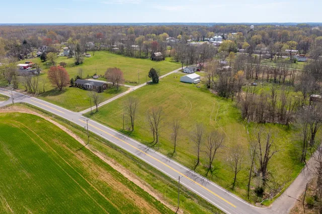a view of a lake with a building in the background