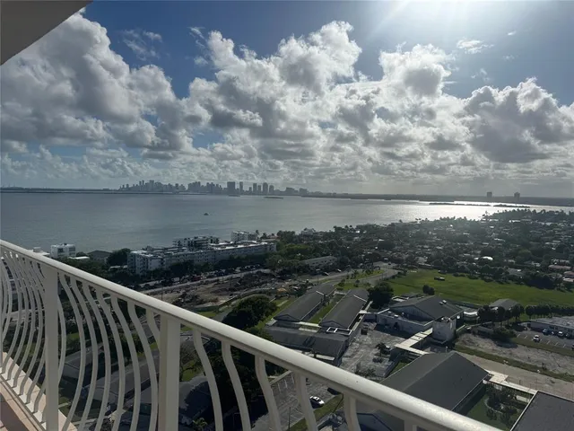 a view of city and roof