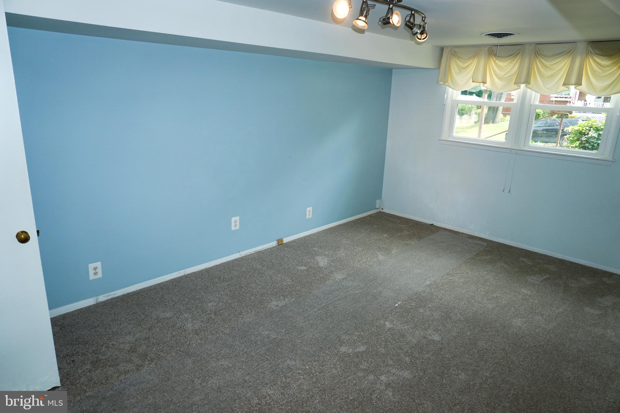 7425 Flora Street Springfield, VA 22150 - Photo 8 of 23 an empty room with a window