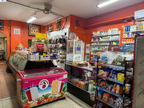 a store filled with lots of fruit and vegetables