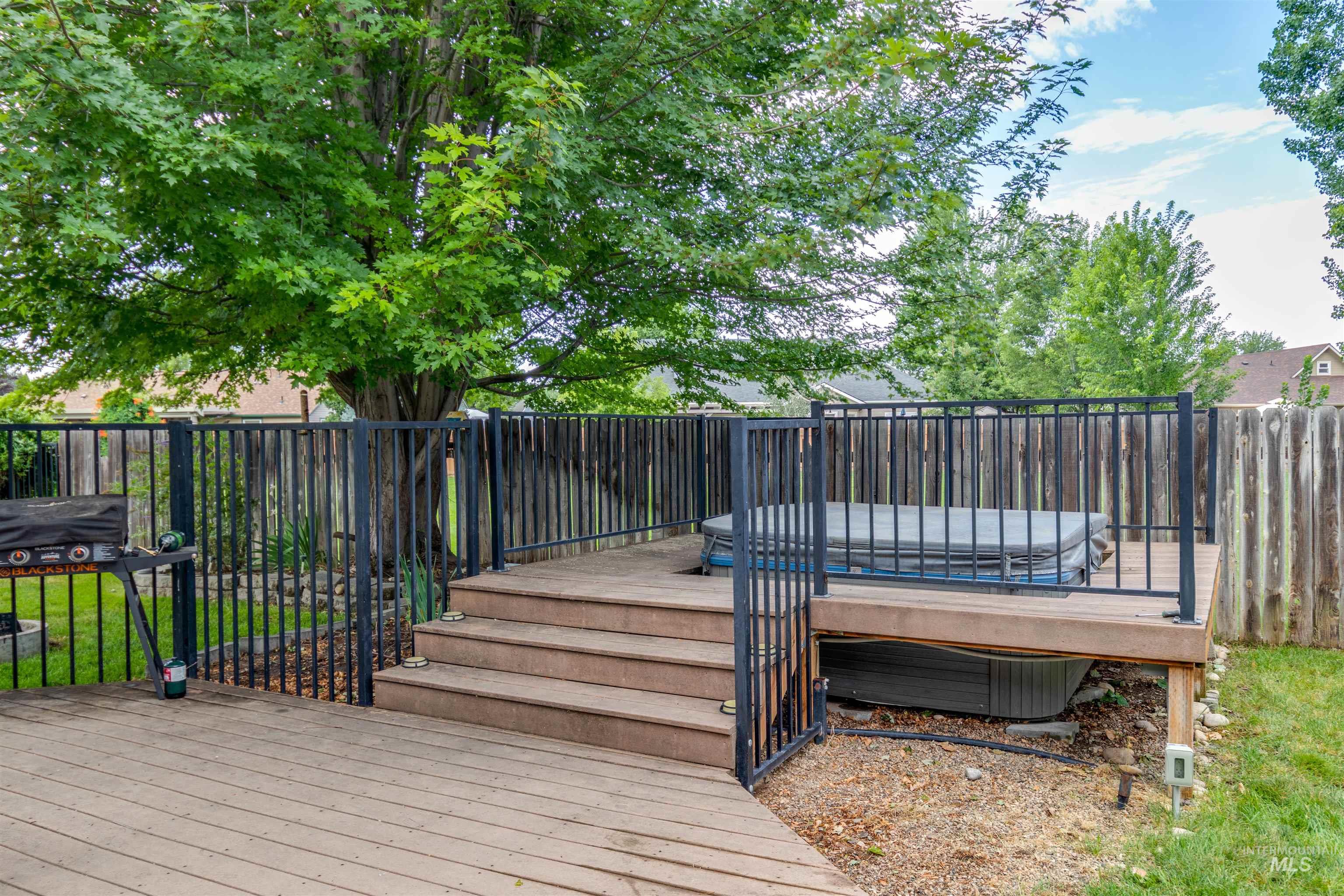 485 North Nebula Avenue Star, ID 83669 - Photo 32 of 47 Wooden terrace featuring a covered hot tub