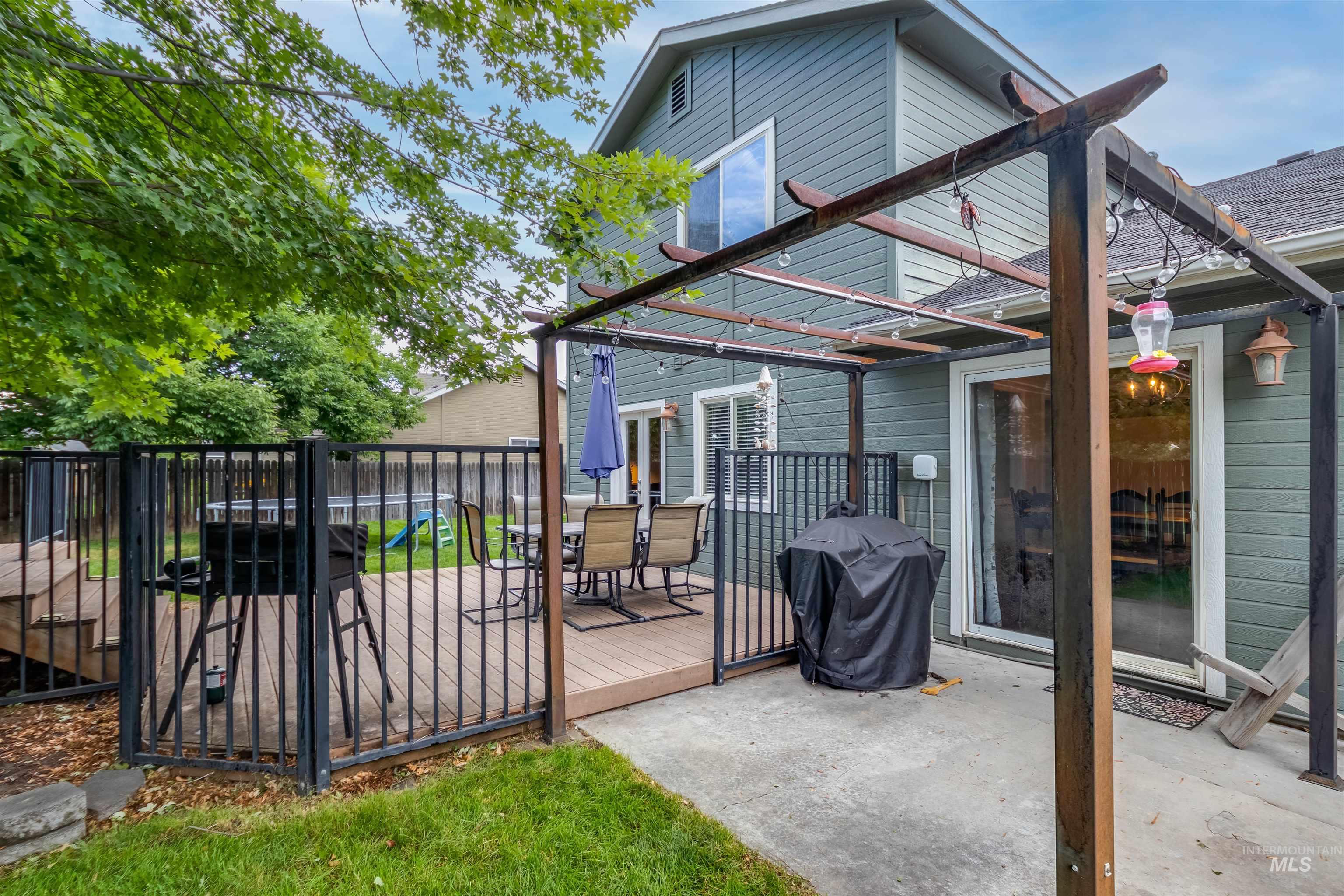 485 North Nebula Avenue Star, ID 83669 - Photo 37 of 47 Rear view of property with a deck, a pergola, and outdoor dining area
