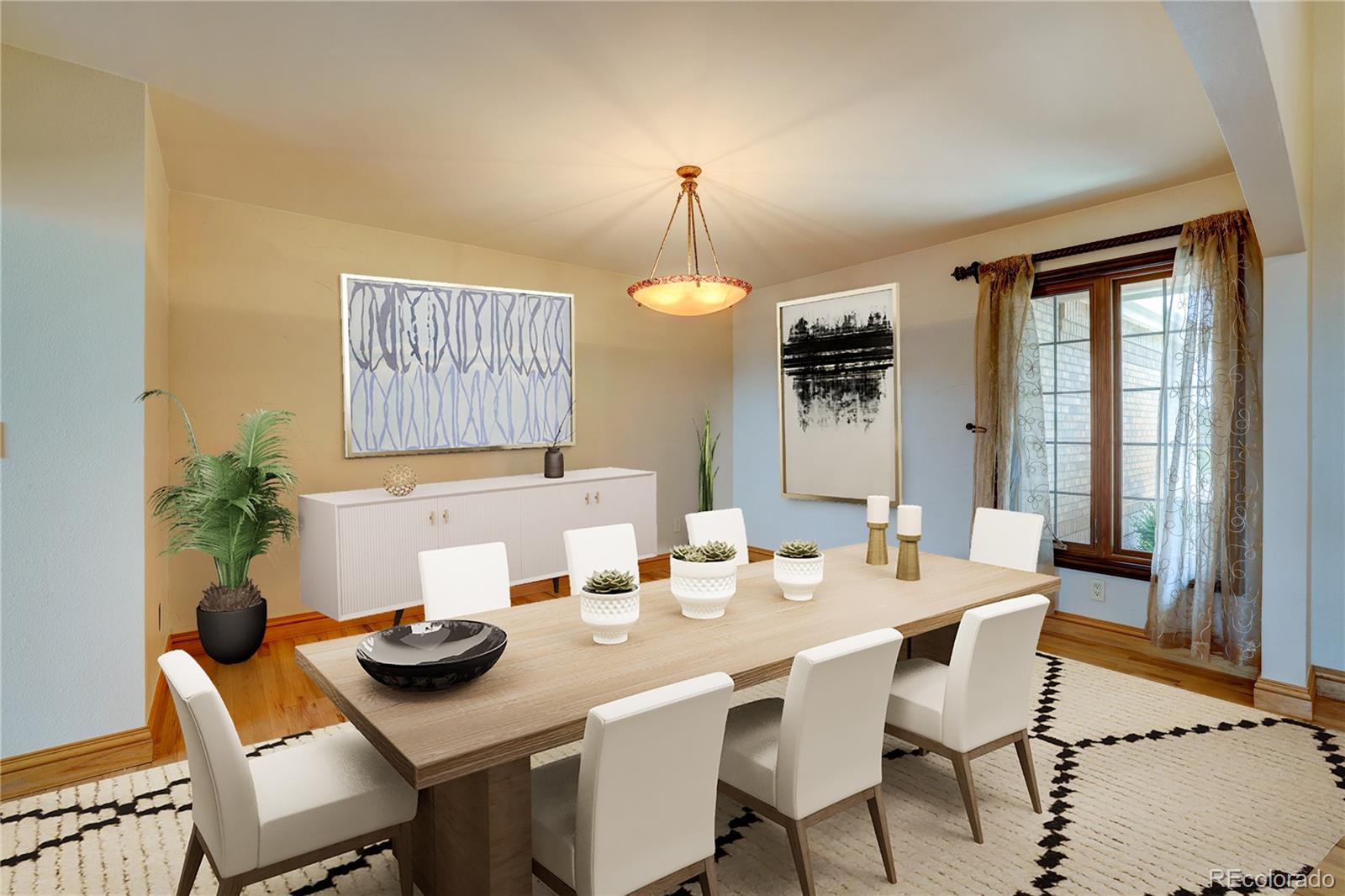 8844 South Forrest Drive Highlands Ranch, CO 80126 - Photo 8 of 40 a dining room with furniture and window