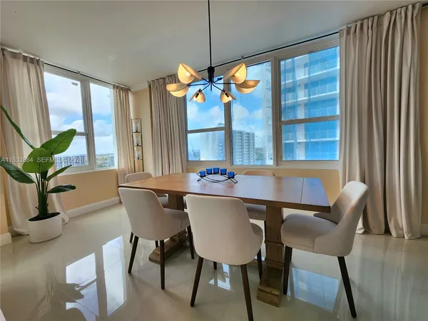 a view of a dining room with furniture