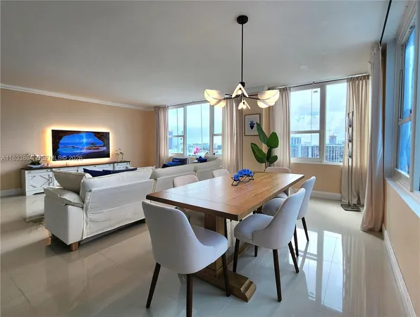 a view of a dining room with furniture window and outside view