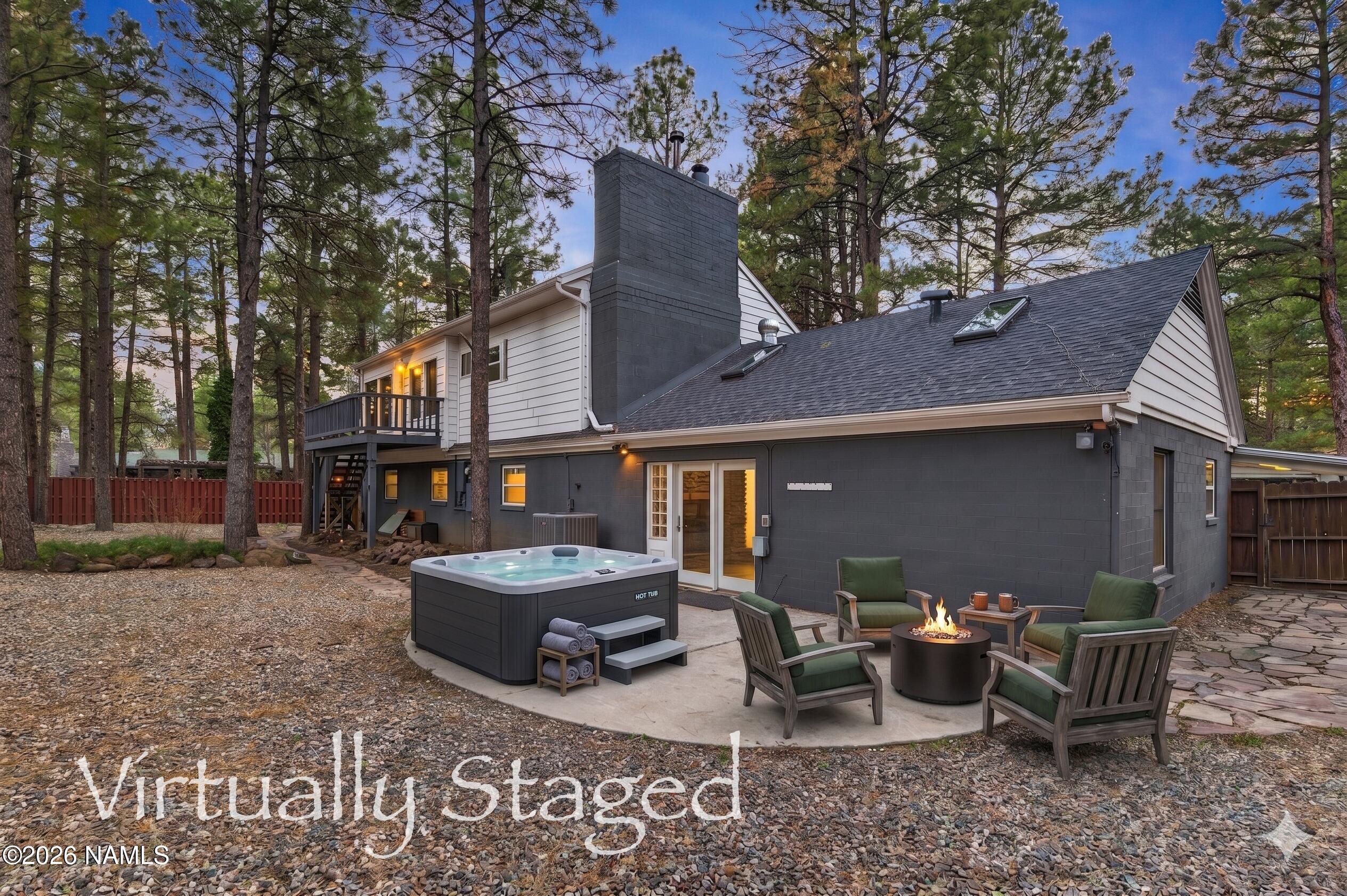 530 East Charles Road Flagstaff, AZ 86001 - Photo 50 of 54 a backyard of a house with table and chairs