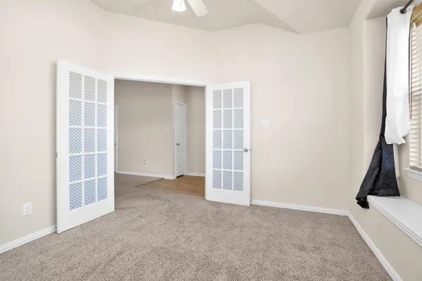 an empty room with windows