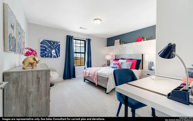 a bedroom with two beds and a dresser