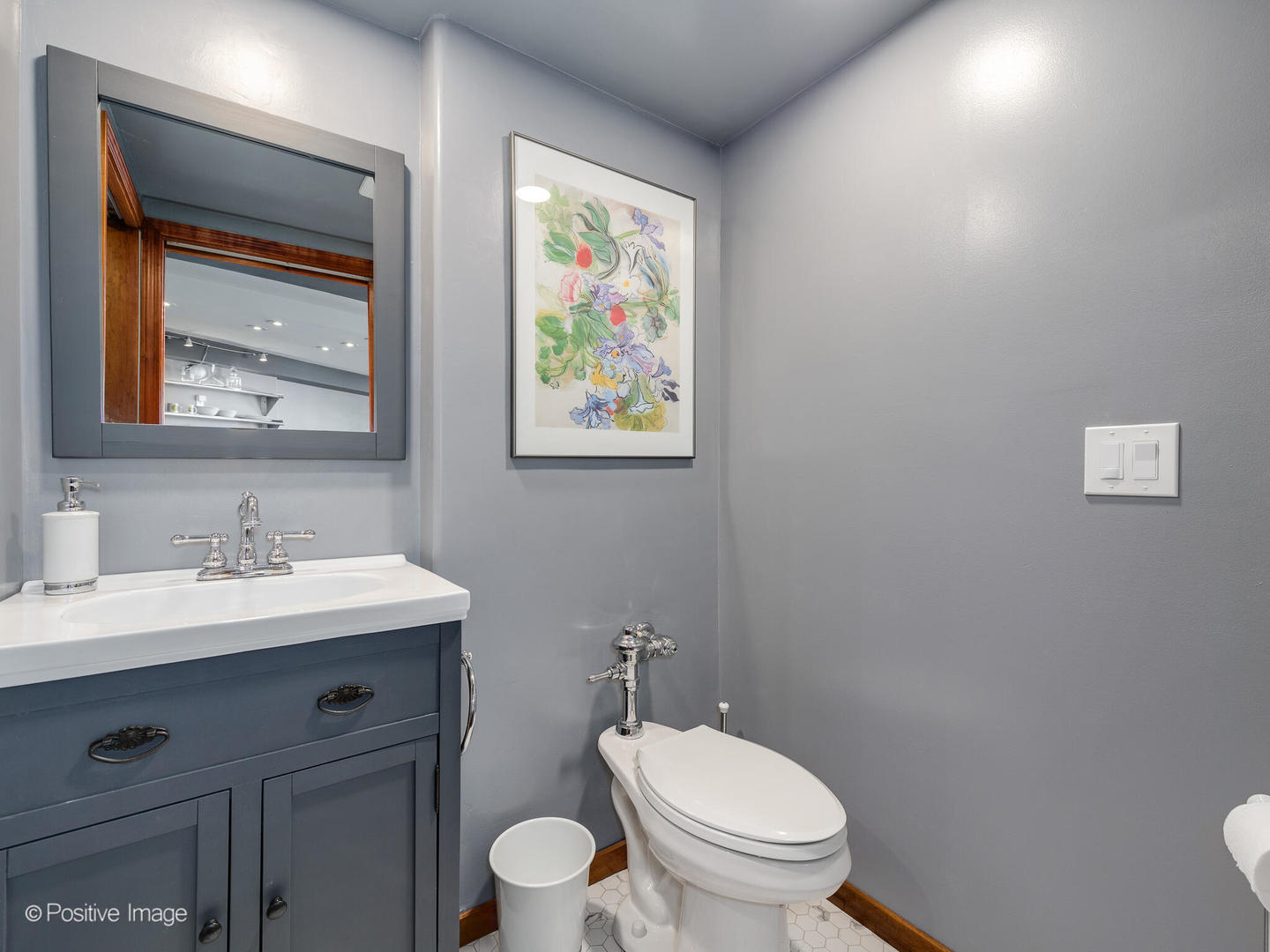 300 North State Street, Unit 5317 Chicago, IL 60654 - Photo 10 of 27 a bathroom with a toilet a sink and mirror