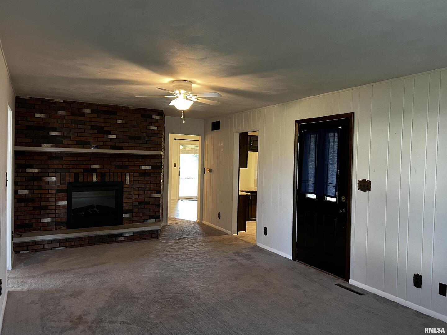 210 West Fifth Street St. Peter, IL 62880 - Photo 18 of 48 a view of an empty room and fire place