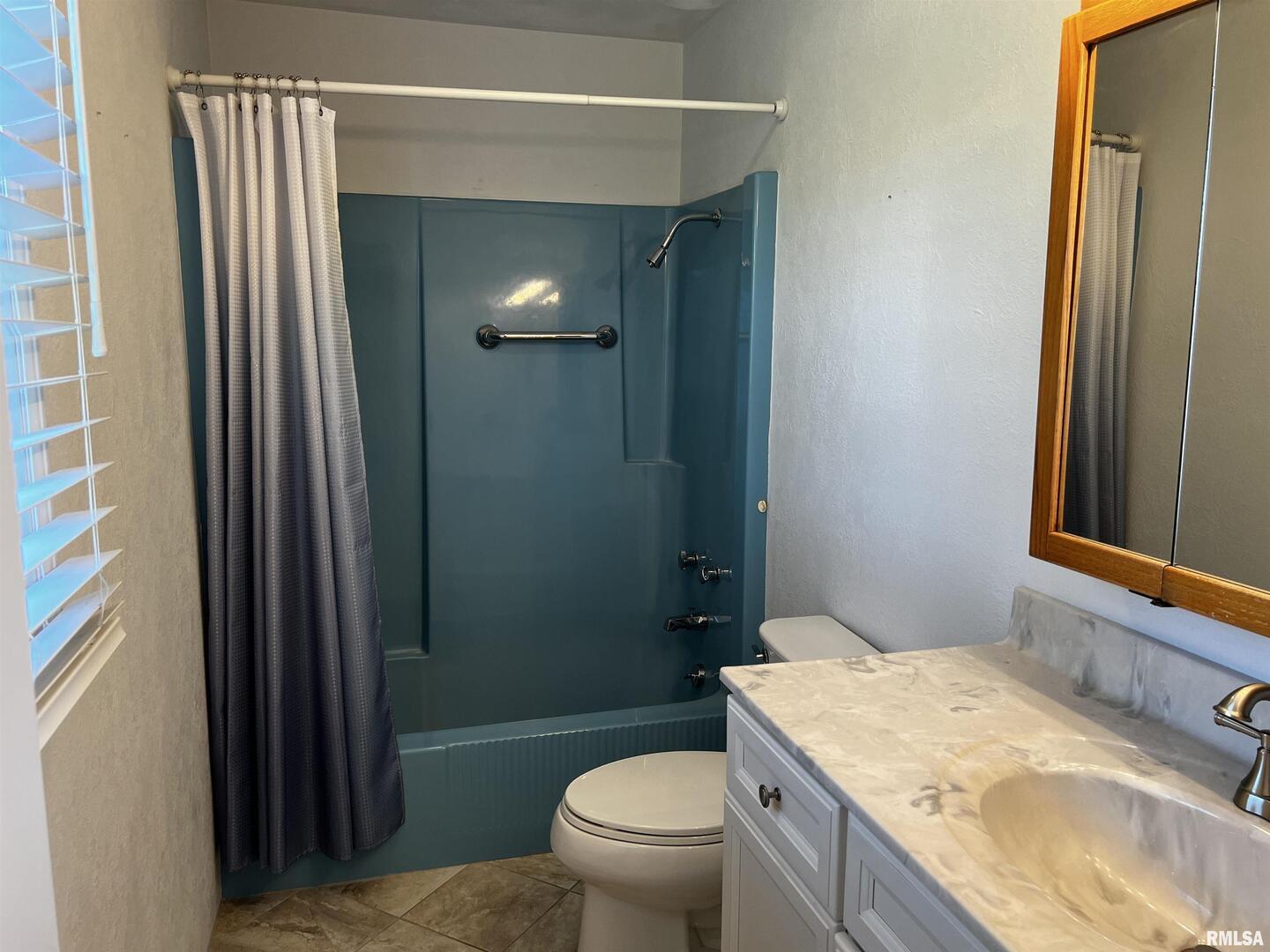 210 West Fifth Street St. Peter, IL 62880 - Photo 33 of 48 a bathroom with a granite countertop sink toilet and shower