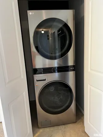 a utility room with washing machine