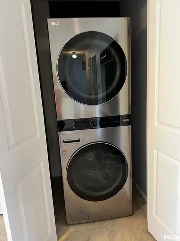 a utility room with washing machine