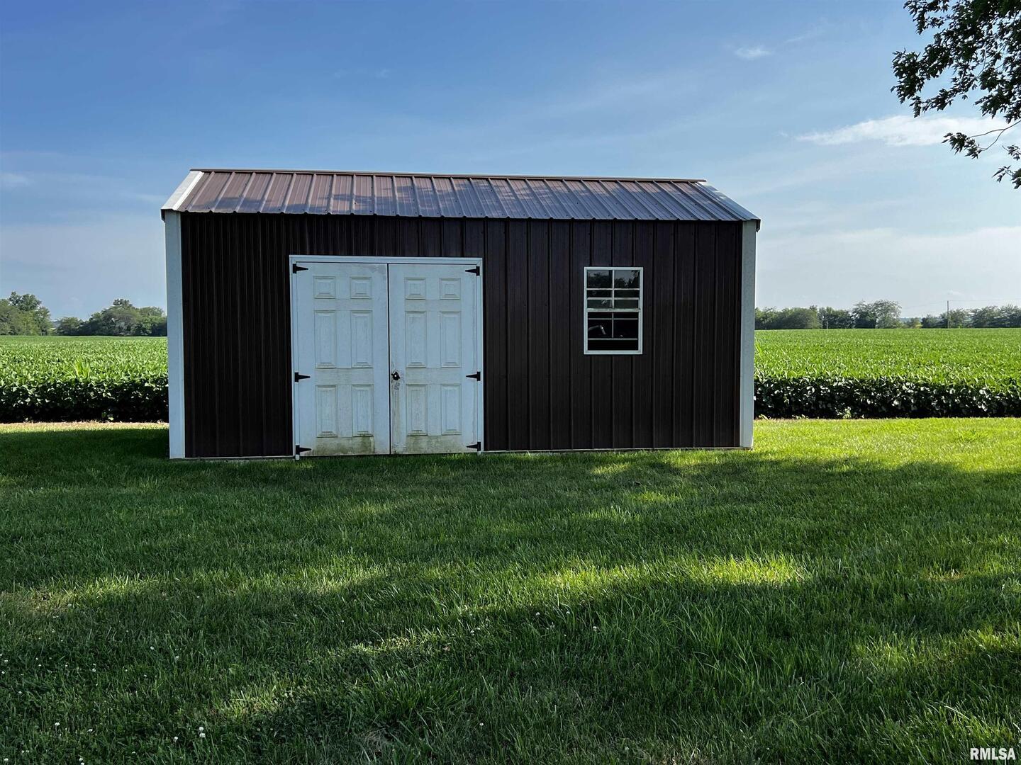210 West Fifth Street St. Peter, IL 62880 - Photo 9 of 48 a view of a house with a small yard