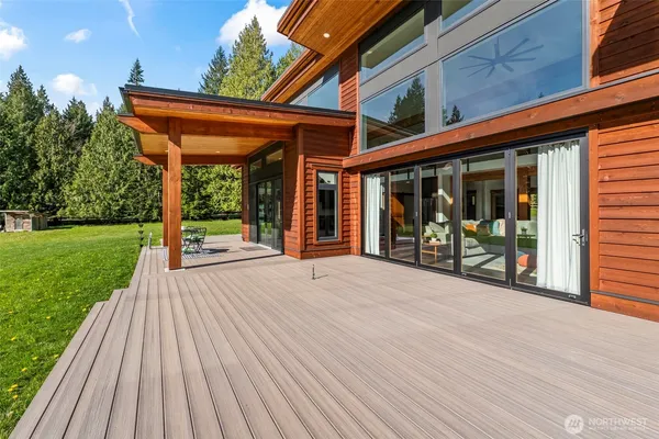 a backyard of a house with seating space