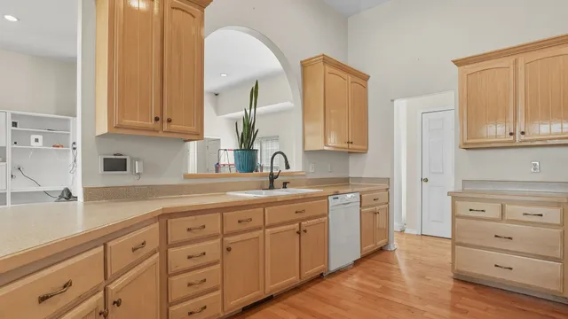 a bedroom with bed and a window