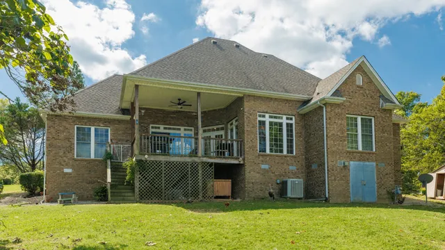 a view of a lake with a yard