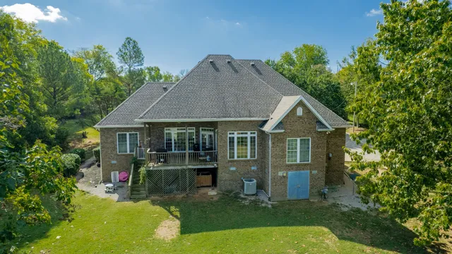 a view of a backyard with pathway